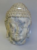 A rustic Buddha head. 35 cm high.