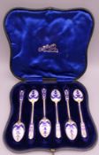 A set of six silver gilt blue and white enamel tea spoons, Birmingham 1959.