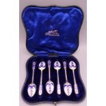 A set of six silver gilt blue and white enamel tea spoons, Birmingham 1959.