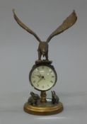 An eagle ball clock. 21.5 cm high.
