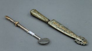 A 19th century Mate drinking straw (tests silver) with applied gold decoration and a white metal