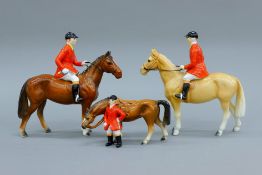 Three porcelain models of Huntsmen Horses.