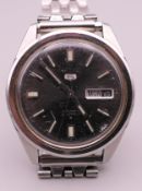 A Seiko Day Date gentlemen's wristwatch. 3.5 cm wide.