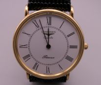 A 9 K gold Longines wristwatch. 3.5 cm wide.