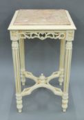 A white marble top square table. 41 cm squared.