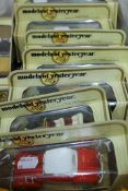 A collection of boxed Models of Yesteryear die cast vehicles.