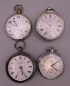 Three silver pocket watches and another.