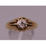 A gentleman's 18 ct gold diamond ring. Ring size S. 7.4 grammes total weight. Approximately 0.7/0.