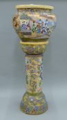 A late 19th century Japanese Satsuma jardiniere on stand. 94 cm high.