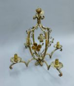 A vintage wrought iron chandelier. 59 cm high.