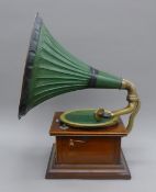 A vintage Commonwealth gramophone with horn. 75.5 cm high.