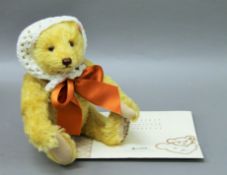 A Steiff musical teddy bear.