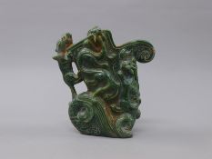 A Chinese carved green hardstone ewer. 20 cm high.