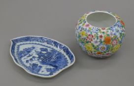 An 18th century Chinese blue and white Elain leaf shaped spoon tray and a 19th century Chinese