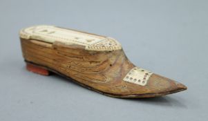 A 19th century bone mounted wooden snuff shoe. 14.5 cm long.