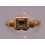 An early, possibly Medieval unmarked gold ring. Ring I/J. 1.6 grammes total weight.