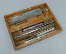 A 19th century mahogany cased field surgeons set. 23 cm long.