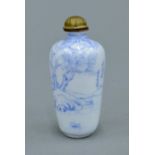 A Chinese blue and white enamel snuff bottle, signed. 6.5 cm high.
