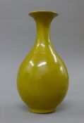 A Chinese porcelain yellow crackle glaze vase. 24 cm high.