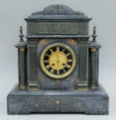 A Victorian black slate mantle clock. 41 cm high.