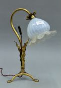 A Victorian brass bulrush design desk lamp, with moulded vaseline glass shade,