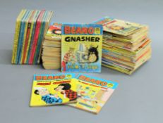 A quantity of Beano comics and other books.