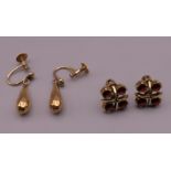 A pair of 14 ct gold and garnet ear studs (3.