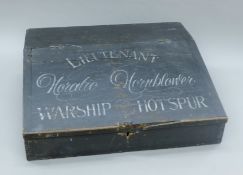 A 19th century child's painted desk top/writing slope. 53 cm wide.