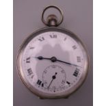 A silver pocket watch. 4.5 cm diameter.