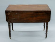 A 19th century mahogany Pembroke table. 99 cm long.