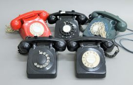 A quantity of vintage telephones.