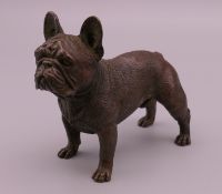 A bronze model of a French bulldog. 7.5 cm long.