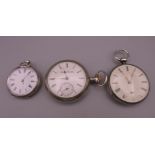 Two silver pocket watches and a plated pocket watch.