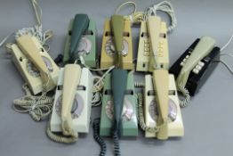 A quantity of vintage telephones.