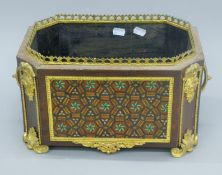 A 19th century Continental parquetry inlaid planter. 38 cm wide.