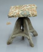 A Glenister of High Wycombe industrial stool. 46 cm high.