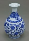 A large Chinese blue and white porcelain vase. 37 cm high.