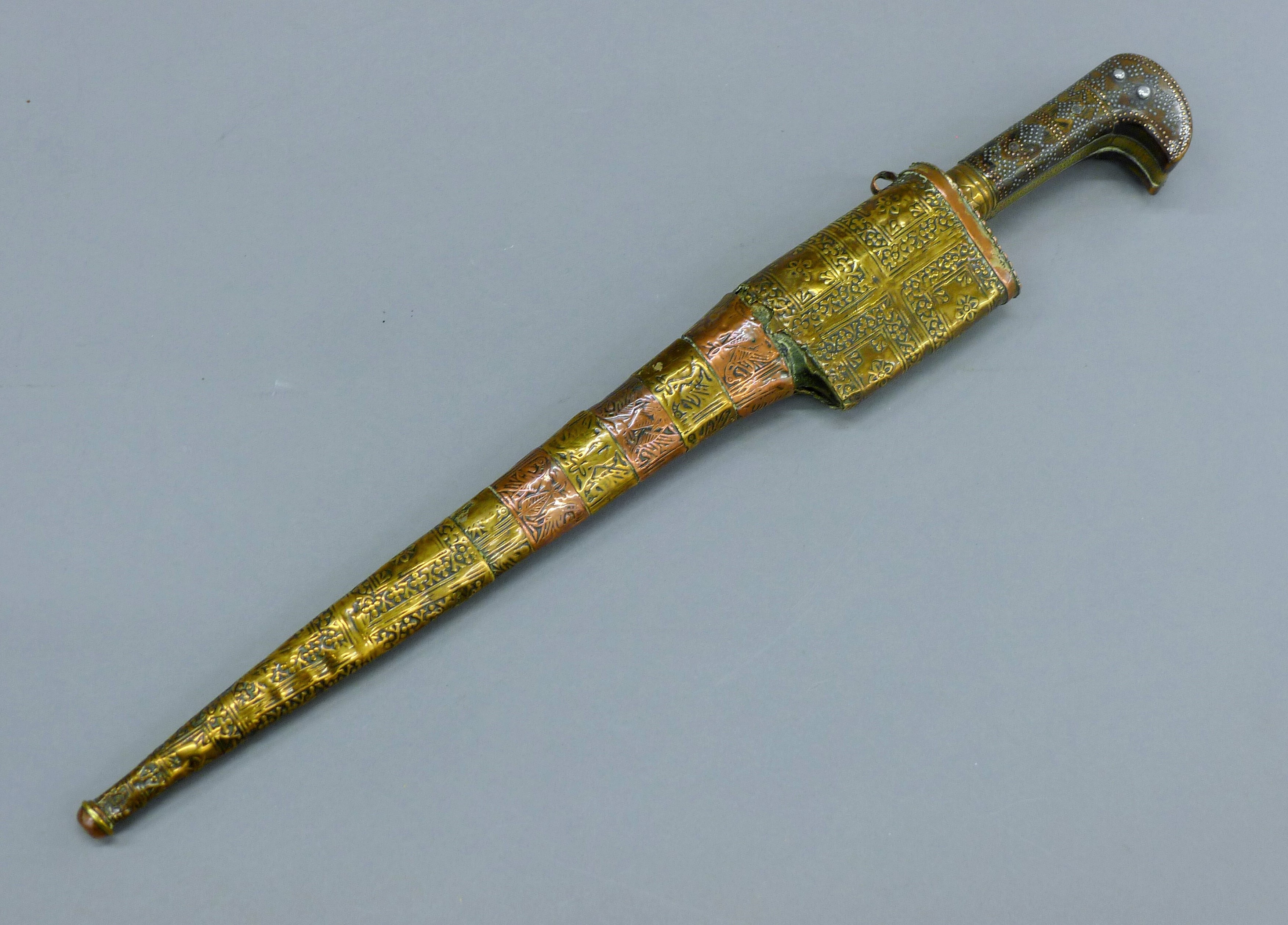 A finely worked Khyber dagger and pique horn grip, curved edge blade, - Image 2 of 17