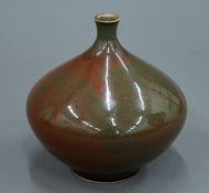 A Chinese squat porcelain vase. 14 cm high.