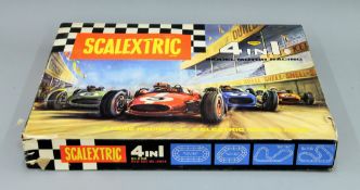 A Scalextric set 80 four lane racing track and cars including paperwork with original outer box.