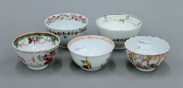 Five Chinese porcelain tea bowls.