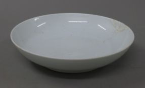 A Chinese blanc de chine plate. 21 cm diameter.