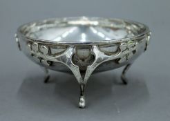 An Art Nouveau silver three footed dish, hallmarked for Birmingham 1913. 9.5 cm diameter. 82.