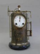 A bronze industrial clock. 41.5 cm high.