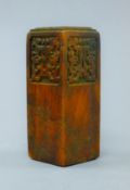 A Chinese soapstone seal. 10 cm high.
