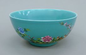 A Chinese turquoise ground porcelain bowl. 21.5 cm diameter.