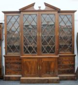 A George III mahogany breakfront library bookcase, possibly Irish.