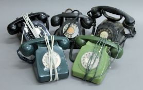 A quantity of vintage telephones.