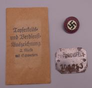 A German Military dog tag, etc.