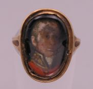 An unmarked gold memorial ring, possibly George III Officer in uniform. Ring size L. 3.